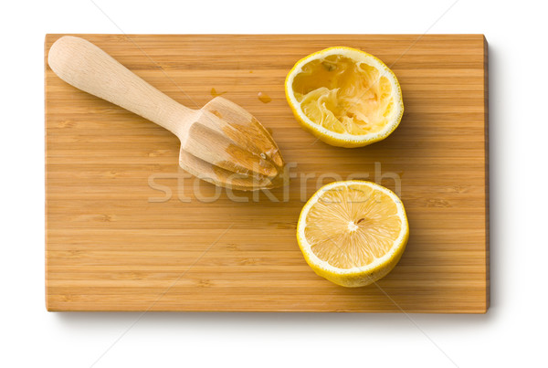 squeezed lemon fruit and citrus reamer Stock photo © jirkaejc