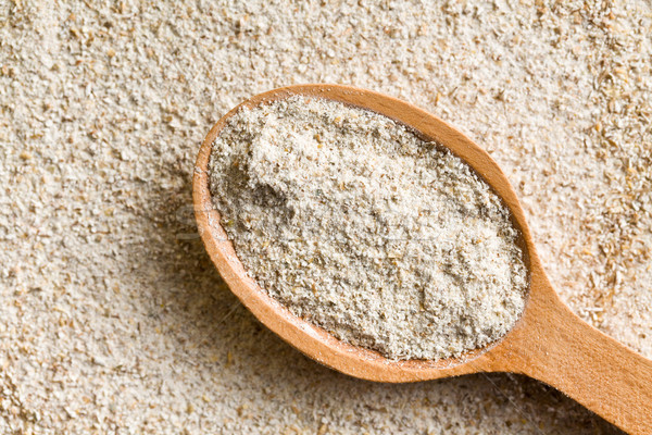 wholemeal flour in wooden spoon Stock photo © jirkaejc
