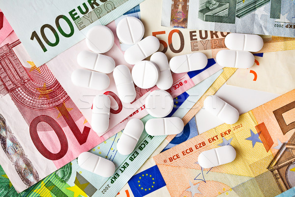 pills and euro banknotes Stock photo © jirkaejc