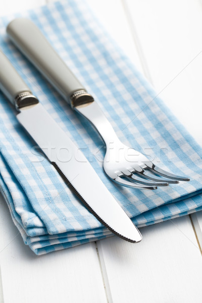 fork and knife on checkered napkin Stock photo © jirkaejc