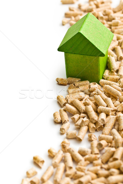 Concept of ecological and economic heating. Wooden pellets. Stock photo © jirkaejc