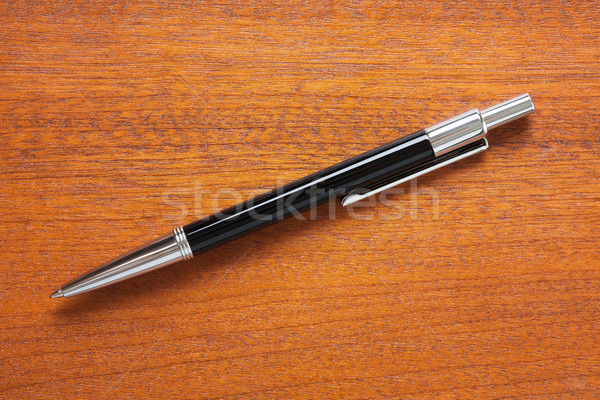black pen on wooden desk Stock photo © jirkaejc