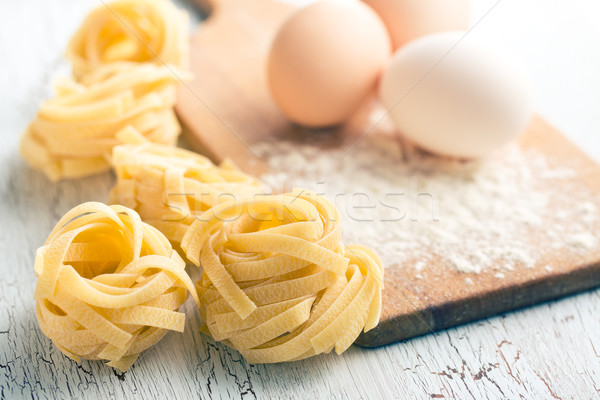 Italian pasta tagliatelle, eggs and flour Stock photo © jirkaejc