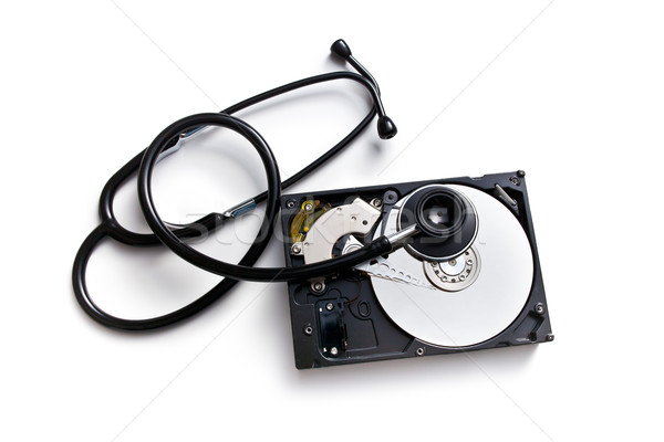 Stetoskop sabit disk beyaz arka plan güvenlik yazılım Stok fotoğraf © jirkaejc