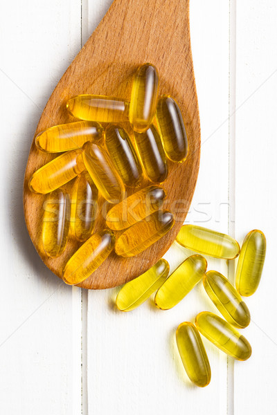 Cod liver oil. Gel capsules Stock photo © jirkaejc