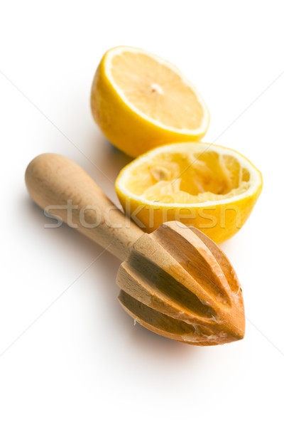 squeezed lemon fruit and citrus reamer Stock photo © jirkaejc