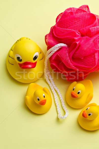 yellow bath ducks and bath puff Stock photo © jirkaejc