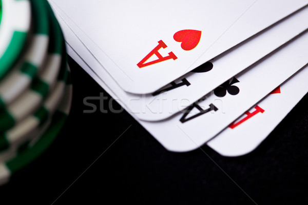 Carte da gioco poker chips soldi cuore tavola blu Foto d'archivio © jirkaejc