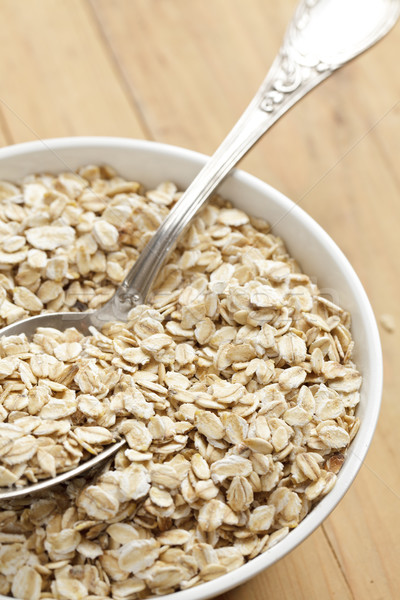 oatmeal on wooden table Stock photo © jirkaejc