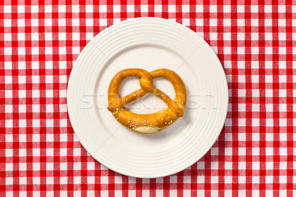 pretzel on white plate Stock photo © jirkaejc
