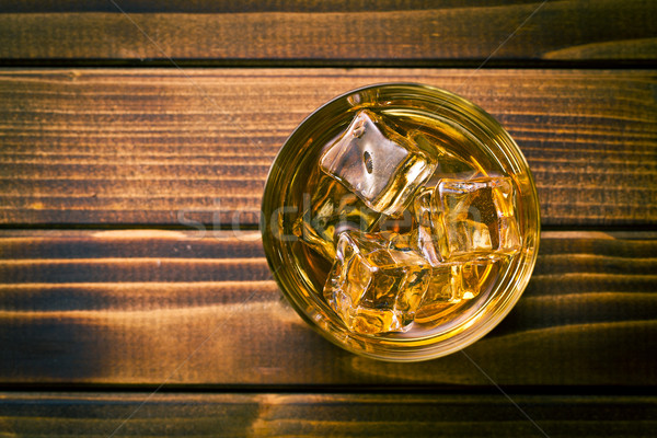 Whiskey top view vetro ghiaccio bere Foto d'archivio © jirkaejc