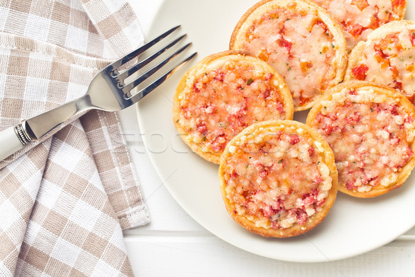 Mini pizza plaque pain fromages déjeuner [[stock_photo]] © jirkaejc