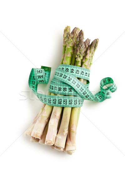 Stock photo: asparagus with measuring tape