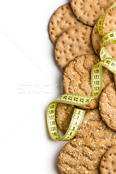 Crispbread with measuring tape Stock photo © jirkaejc
