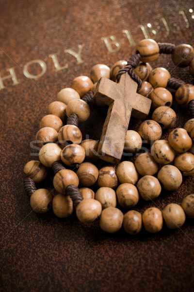 wooden rosary on the Bible Stock photo © jirkaejc