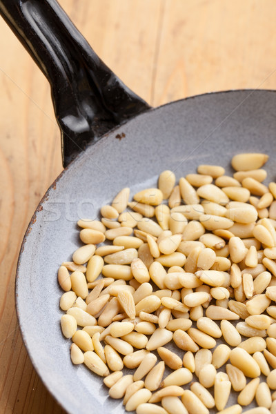 roasted pine nuts on pan Stock photo © jirkaejc