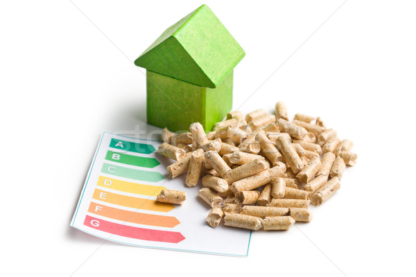 Concept of ecological and economic heating. Wooden pellets. Stock photo © jirkaejc