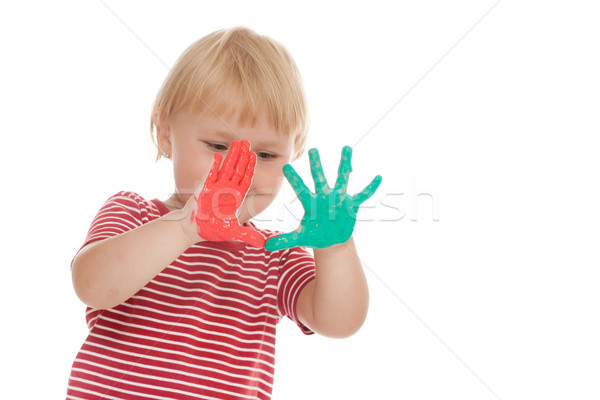 little girl with colorful hands Stock photo © jirkaejc