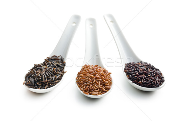 various rice on ceramic spoons Stock photo © jirkaejc