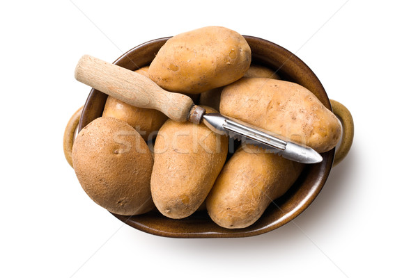 wooden peeler and potatoes Stock photo © jirkaejc