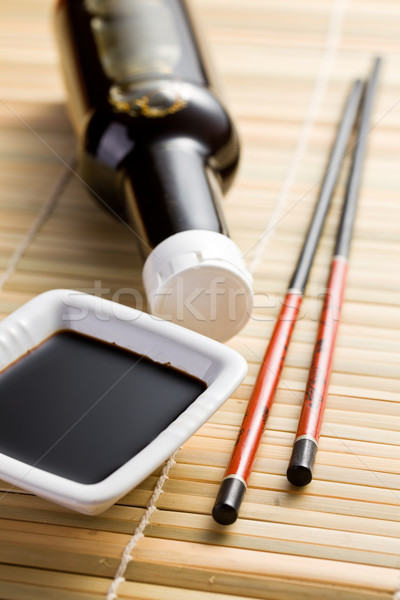 Stock photo: soy sauce and chopsticks