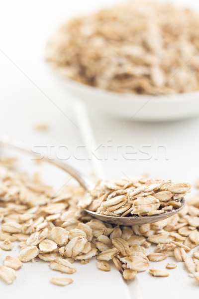 oat flakes in spoon Stock photo © jirkaejc