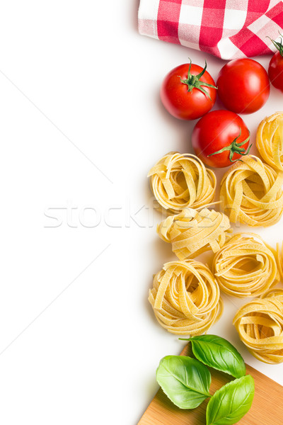İtalyan makarna tagliatelle domates fesleğen yaprakları Stok fotoğraf © jirkaejc