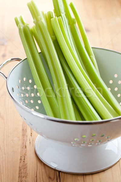 green celery sticks in colander Stock photo © jirkaejc