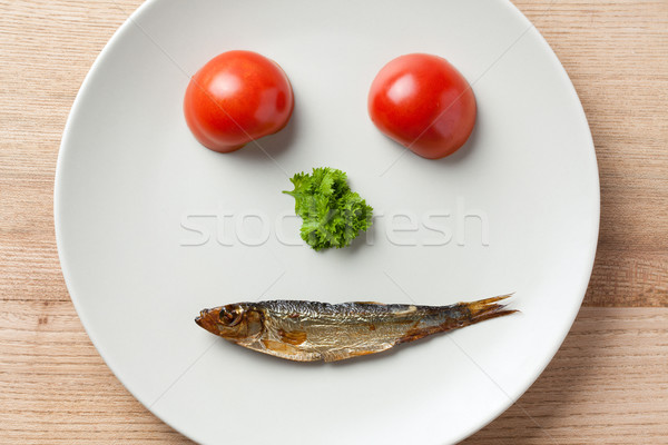 face maked with vegetable and sprat Stock photo © jirkaejc