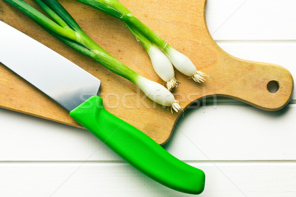 spring onion on cutting board Stock photo © jirkaejc