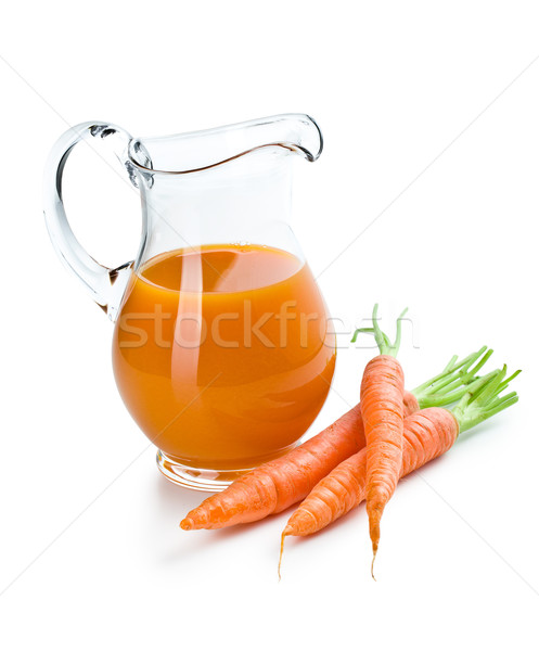 carrot juice in pitcher with carrots Stock photo © jirkaejc