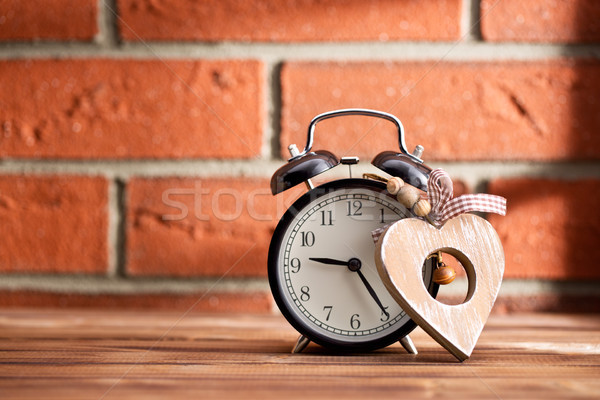wooden heart and alarm clock Stock photo © jirkaejc