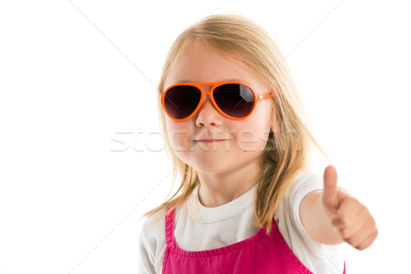 Little girl showing thumbs up Stock photo © jirkaejc