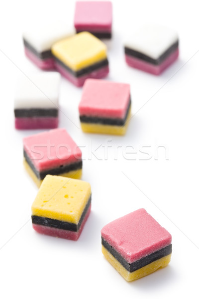 Lukrecja wyroby cukiernicze słodkie biały żywności tle Zdjęcia stock © jirkaejc