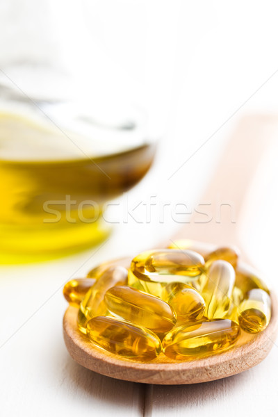 Cod liver oil. Gel capsules Stock photo © jirkaejc