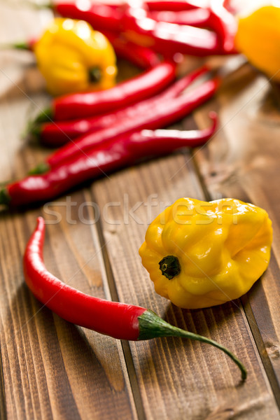 chili peppers and habanero on wooden background Stock photo © jirkaejc