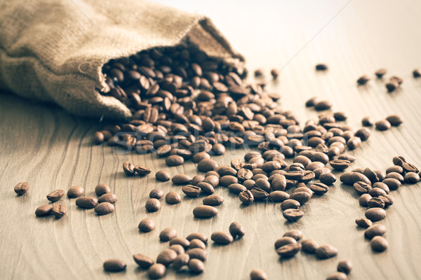 coffee beans spill out of the sack Stock photo © jirkaejc