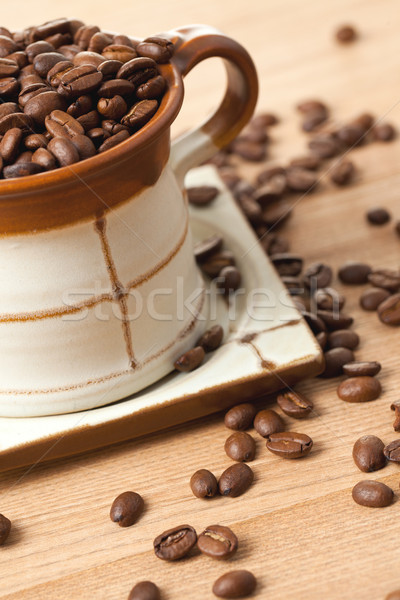 Stock photo: coffee beans in ceramic cup