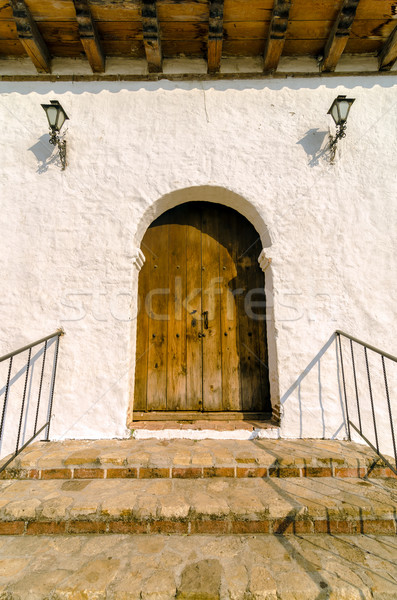Gyarmati ajtó öreg fából készült fehér fal Stock fotó © jkraft5