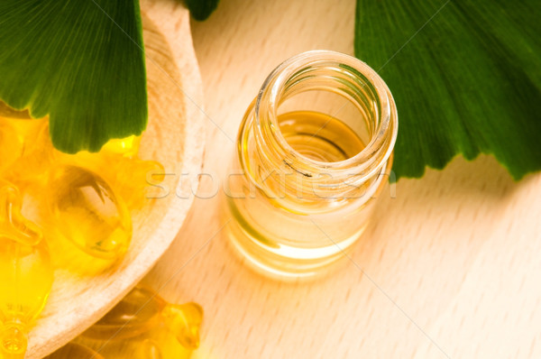 ginko biloba essential oil with fresh leaves - beauty treatment Stock photo © joannawnuk