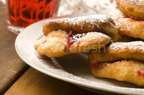 Dough with marmelade on wooden board Stock photo © joannawnuk