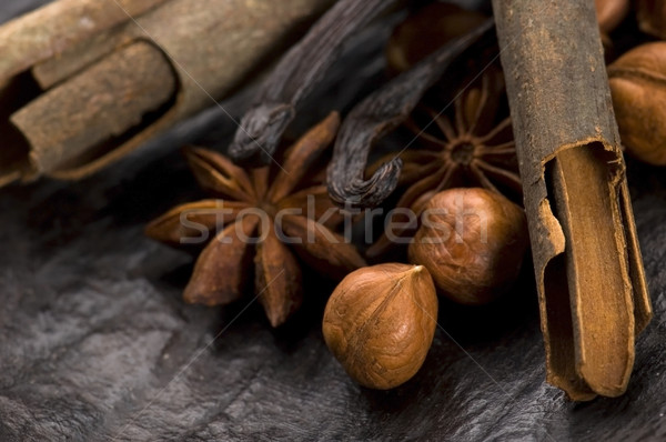 Aromatischen Gewürze brauner Zucker Nüsse Hintergrund Sterne Stock foto © joannawnuk