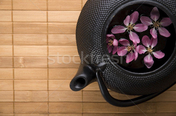 Edény tea teáskanna friss virágok bambusz Stock fotó © joannawnuk