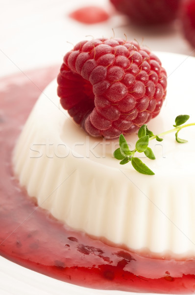 Stock photo: Vanilla panna cotta with berry sauce