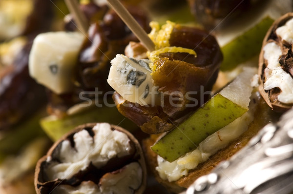 Appetizer Plate with Dactyl, Pecan nuts and Cheese Stock photo © joannawnuk
