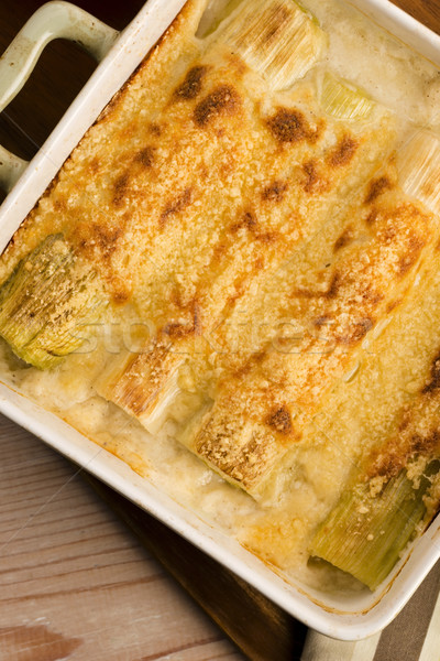 Leeks casserole with white sauce and cheese Stock photo © joannawnuk