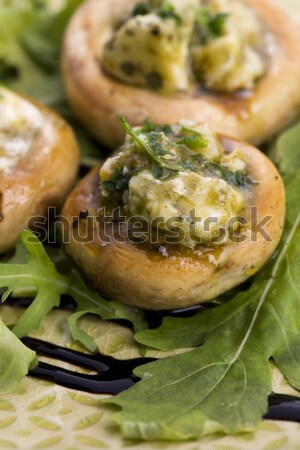 Delicious stuffed mushrooms with cheese and pesto Stock photo © joannawnuk