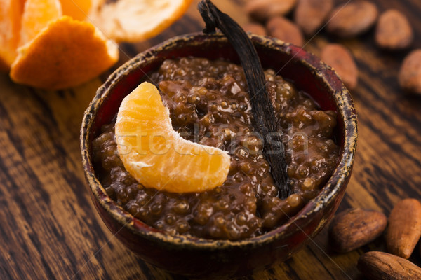 A bowl of chocolate tapioca pudding with fruits Stock photo © joannawnuk