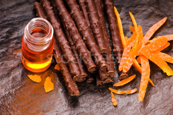 Stock photo: chocolate sticks with orange