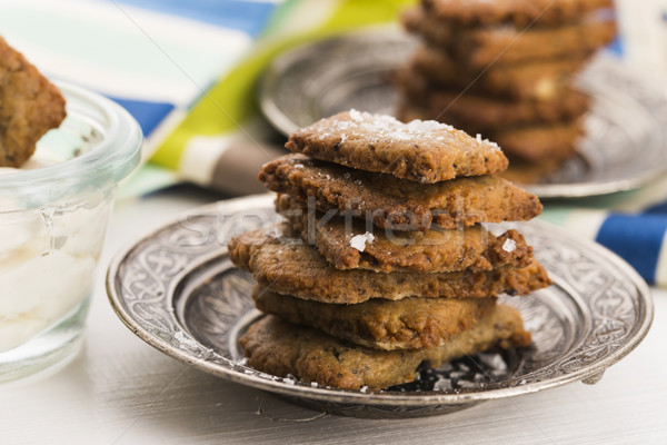 spanish snack crackers with black olives and anchois Stock photo © joannawnuk